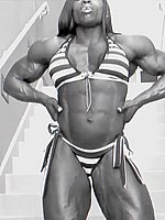 super hot ebony female bodybuilder mistress treasure in ripped contest shape